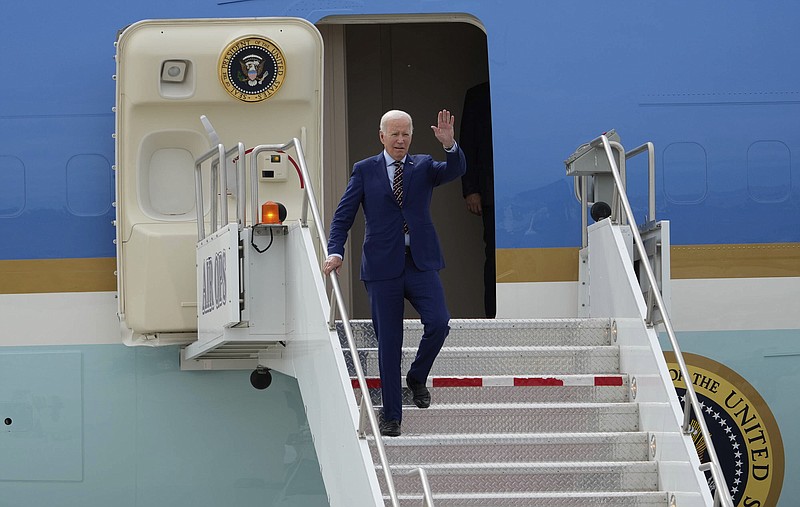 Francisco Kjolseth/The Salt Lake Tribune via AP / President Joe Biden exits Air Force One after landing at Roland R. Wright Air National Guard Base, Wednesday, Aug. 9, 2023, in Salt Lake City.