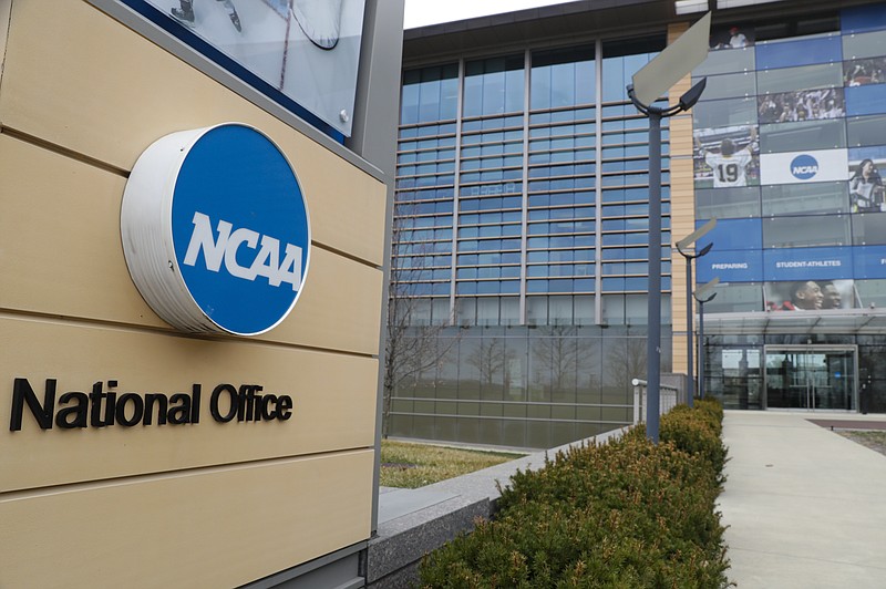 AP file photo by Michael Conroy / A lawsuit filed in West Virginia's northern district challenges the NCAAs authority to impose a one-year delay in the eligibility of certain athletes who transfer between schools.