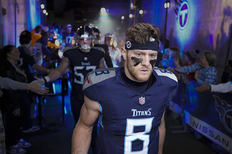 AP photo by George Walker IV / Tennessee Titans quarterback Will Levis (8) walks down the tunnel at Nissan Stadium before last Sunday's game against the Indianapolis Colts in Nashville.