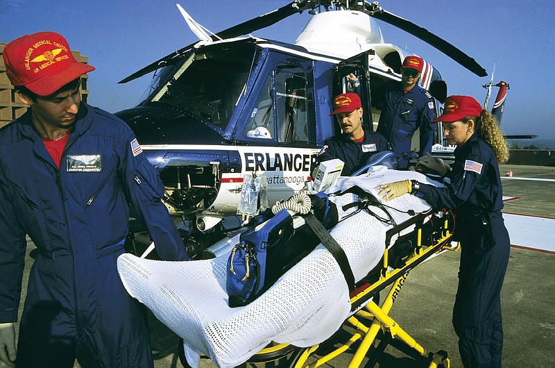 Contributed photography / Life Force crew members transport a patient.