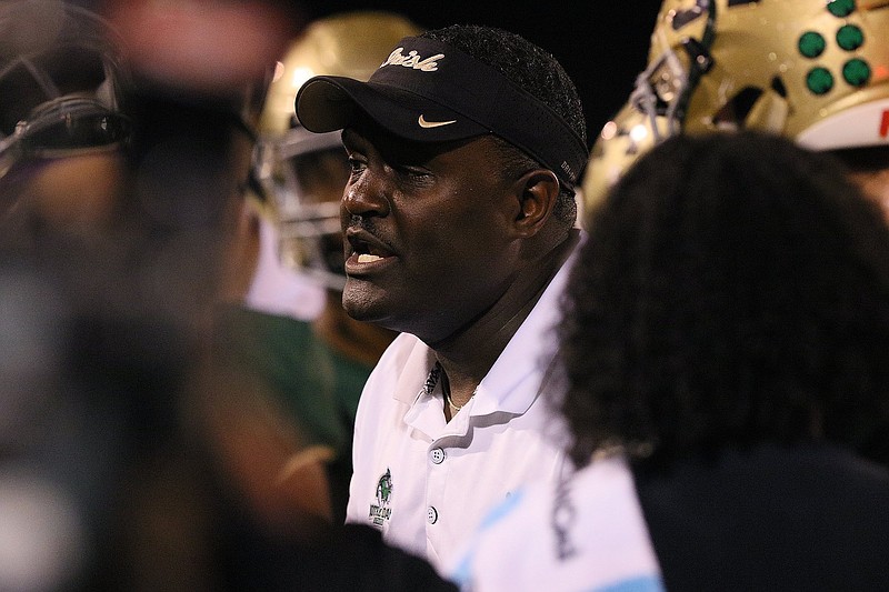 Staff photo / Notre Dame High School football coach Charles Fant speaks with his team during a home game against Silverdale Baptist Academy in October 2018. Fant resigned Thursday after a 12-year tenure leading the Fighting Irish that included the program's lone appearance in a TSSAA title game.