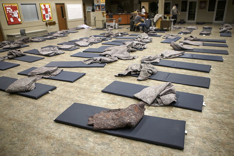 Staff photo / Mats and blankets are seen laid out at the Chattanooga Community Kitchen on Jan. 29, 2019, in Chattanooga. The warming shelter at the Chatt Foundation, then called the Chattanooga Community Kitchen, offers a place to sleep for dozens of people during the winter.