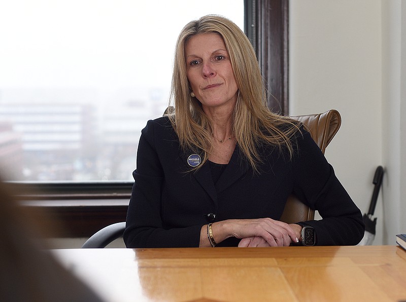 Chattanooga attorney Michele Coffman wants to apply her family