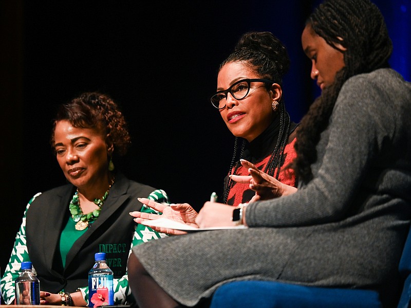 University of Tennessee at Chattanooga / Ilyasah Shabazz, center, the daughter of Malcolm X, speaks as Bernice King, left, the daughter of Martin Luther King Jr., and UTC Student Government Association President Chamyra Teasley listen during the UTC MLK Day speaker series Friday at Memorial Auditorium.