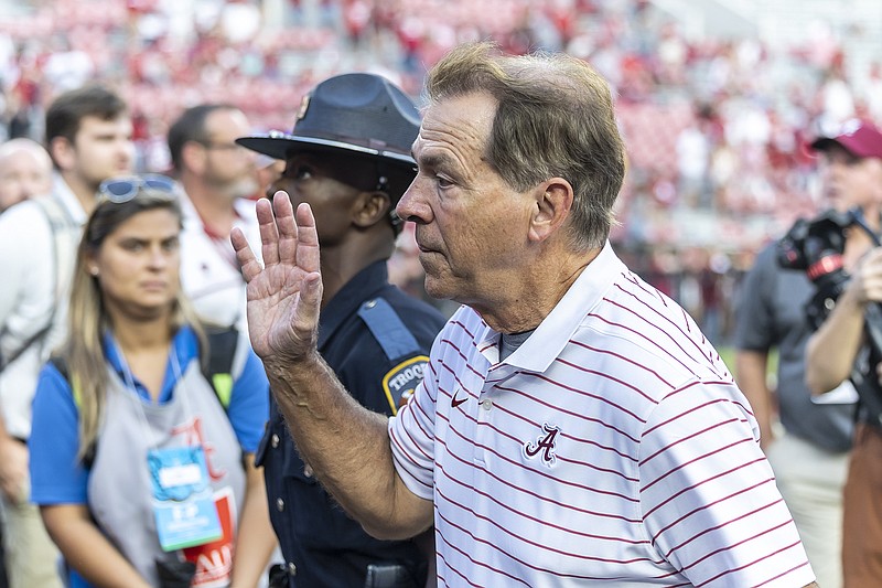 AP photo by Vasha Hunt / Alabama football coach Nick Saban waves to the fans as he leaves the field at Bryant-Denny Stadium after a home win in September 2022. Saban's recent retirement was followed by multiple players for the Crimson Tide entering the transfer portal, with some having already found new programs.