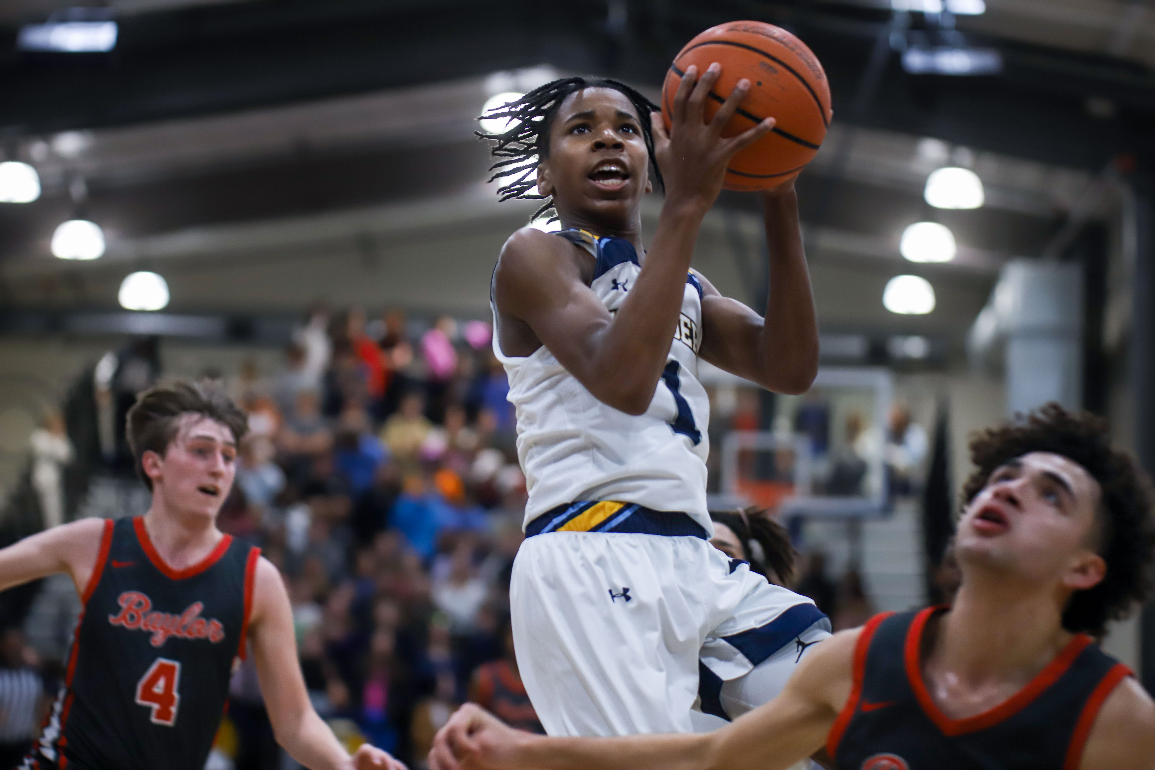 Staff photo by Olivia Ross / CCS's Reid Conley (1) shoots. Chattanooga Christian School took on Baylor at home on Tuesday, January 23, 2024.