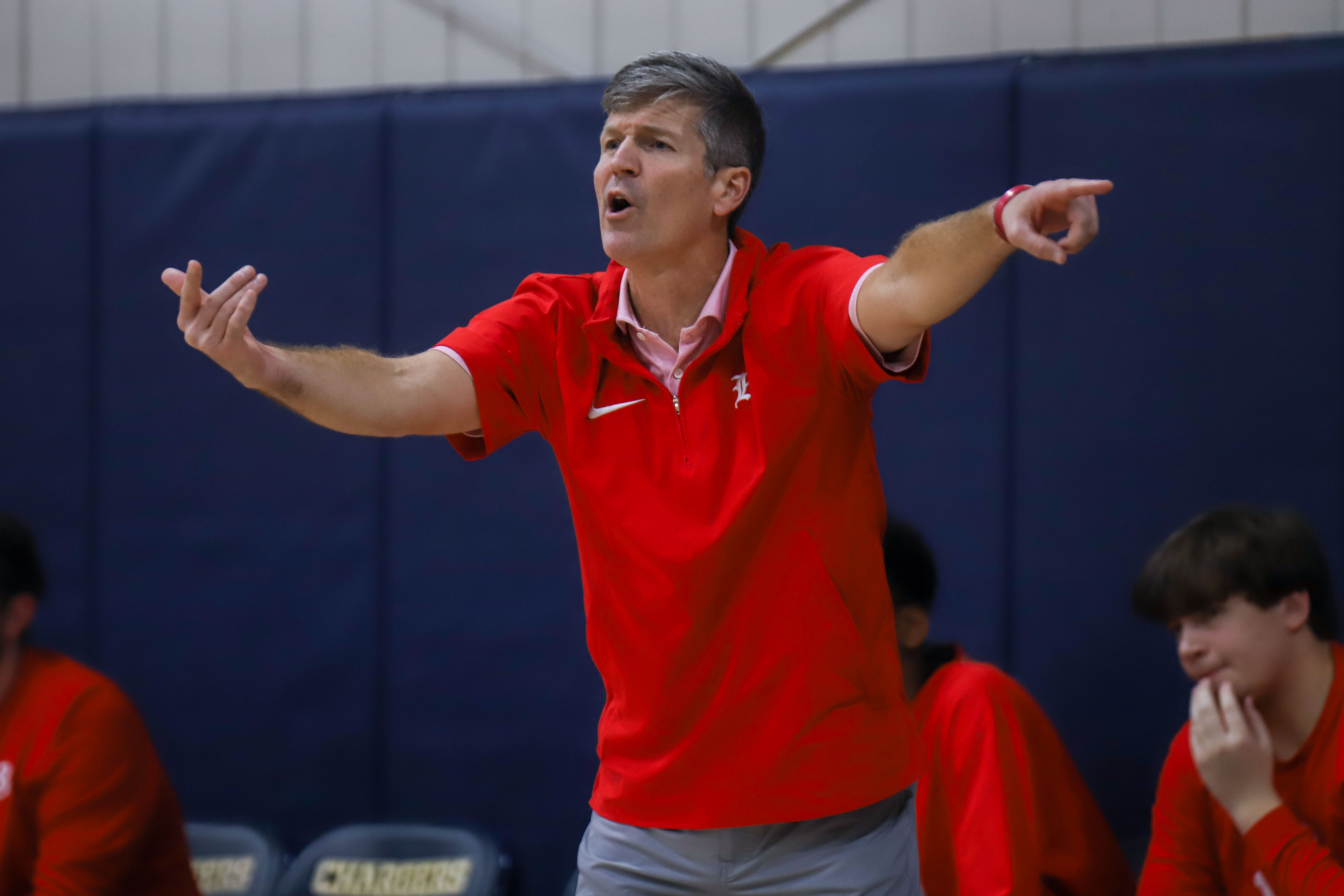 Staff photo by Olivia Ross / Baylor's Head Coach Mark Price calls out from the sidelines. Chattanooga Christian School took on Baylor at home on Tuesday, January 23, 2024.
