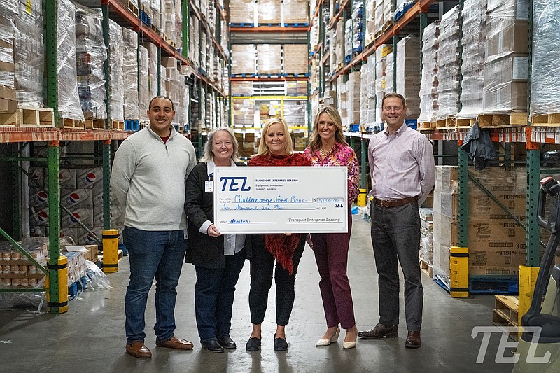 Contributed photo / At the recent check presentation, from left, are Brian Broome and Callie Tissi of Transport Enterprise Leasing (TEL); Melissa Blevins and Summer Simmons of Chattanooga Area Food Bank; and Marc Schmidt of TEL.