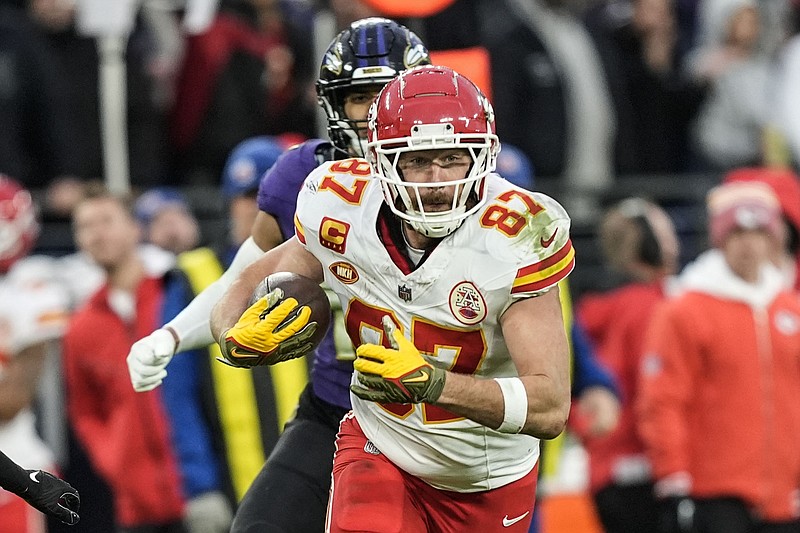 Kansas City Chiefs tight end Travis Kelce takes off for a big gain early in Sunday's AFC Championship game at Baltimore.