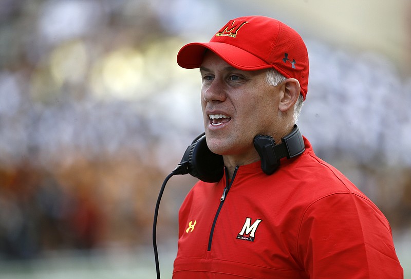 AP photo by Patrick Semansky / DJ Durkin coaches Maryland during a home football game against Towson on Sept. 9, 2017, in College Park.