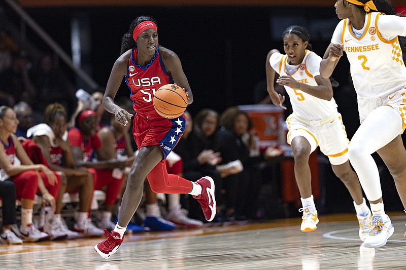 AP photo by Wade Payne / Team USA guard Rhyne Howard brings the ball upcourt during an exhibition game against the University of Tennessee last Nov. 5 in Knoxville.