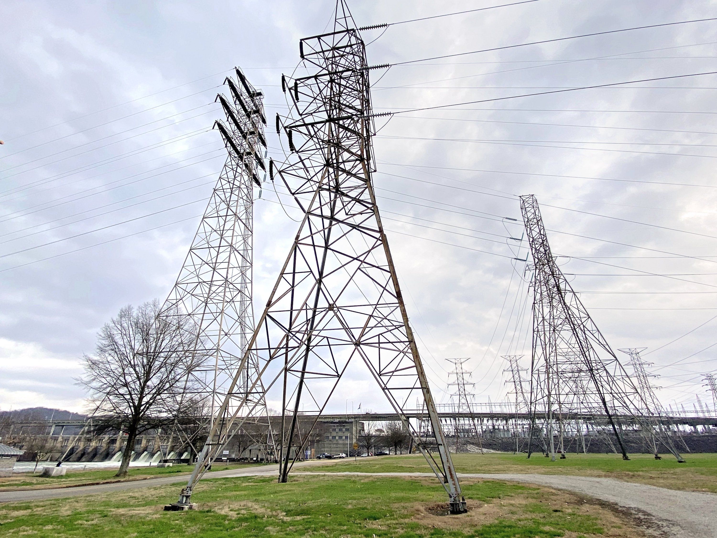 Staff file Photo by Robin Rudd / The Tennessee Valley Authority's Chickamauga Dam is seen in 2023 behind transmission towers.