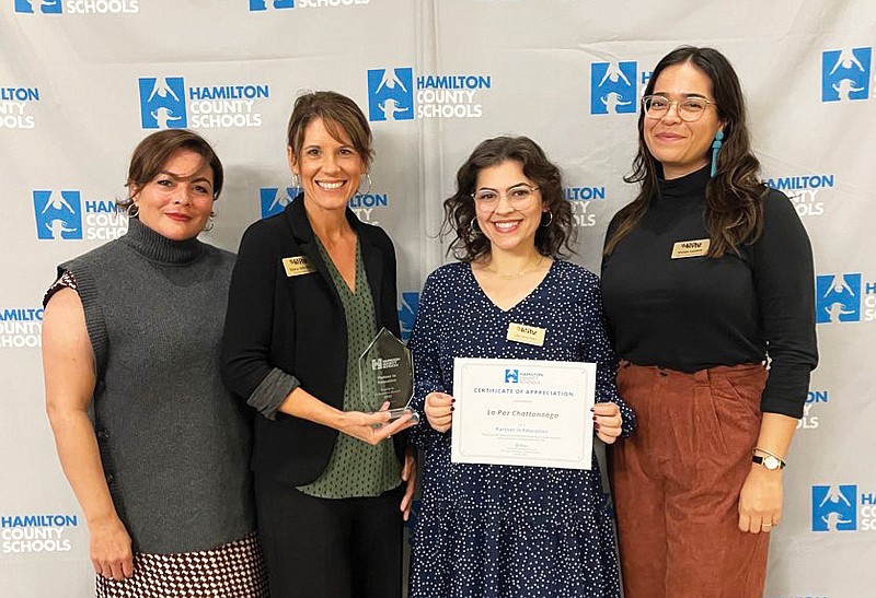 Contributed photo / From left, La Paz Chattanooga staff members Jessica Cliche, Stacy Johnson, Lily Sanchez and Vivian Lozano accept the Hamilton County Schools Partner in Education Award for Equity at the University of Tennessee at Chattanooga in 2022.