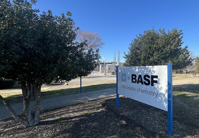 Staff Photo by Dave Flessner / The BASF sign along Amnicola Highway is shown Monday in front of the company's chemical plant. The company is working to make the Chattanooga operations and other plants around the globe carbon neutral by 2050.