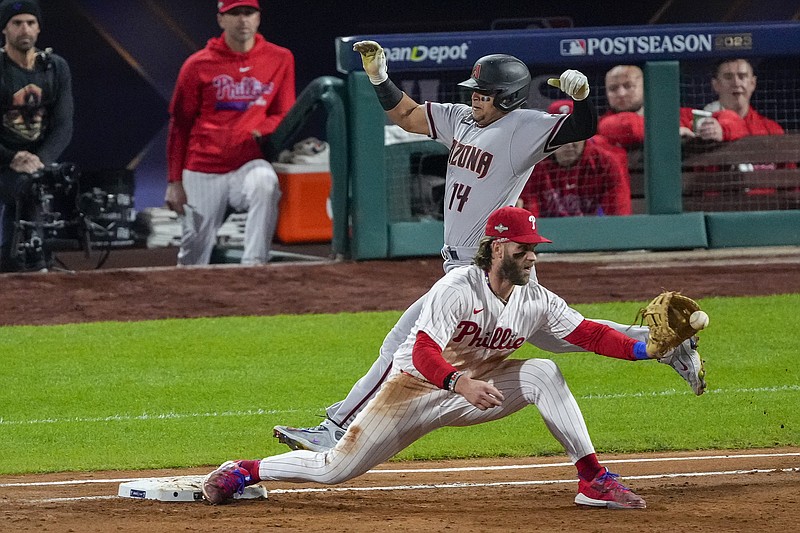 AP photo by Matt Rourke / The Arizona Diamondbacks' Gabriel Moreno is forced out by Philadelphia Phillies first baseman Bryce Harper during Game 2 of the NL Championship Series on Oct. 17, 2023, in Philadelphia.