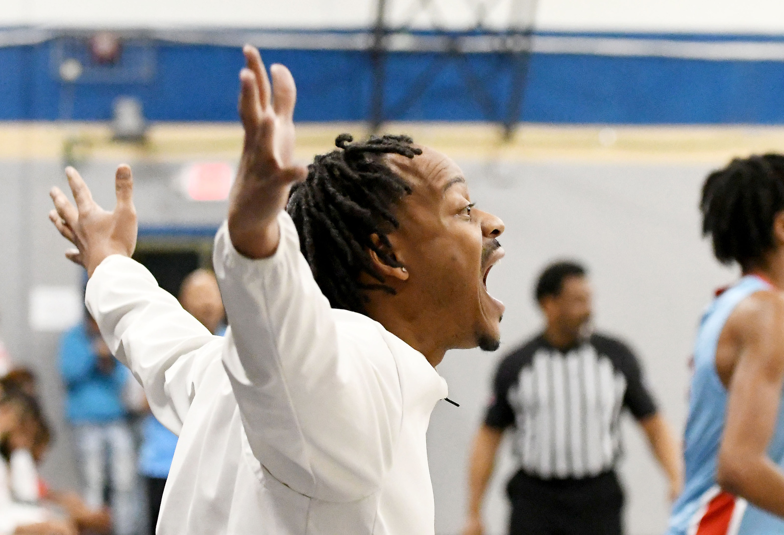 Staff Photo by Robin Rudd / Tyner head coach EJay Ward yells instructions to his team. The Brainerd Panthers met the Tyner Rams in the District 4-AA tournament championship, played at Chattanooga School for Arts and Sciences, on February 20, 2024.