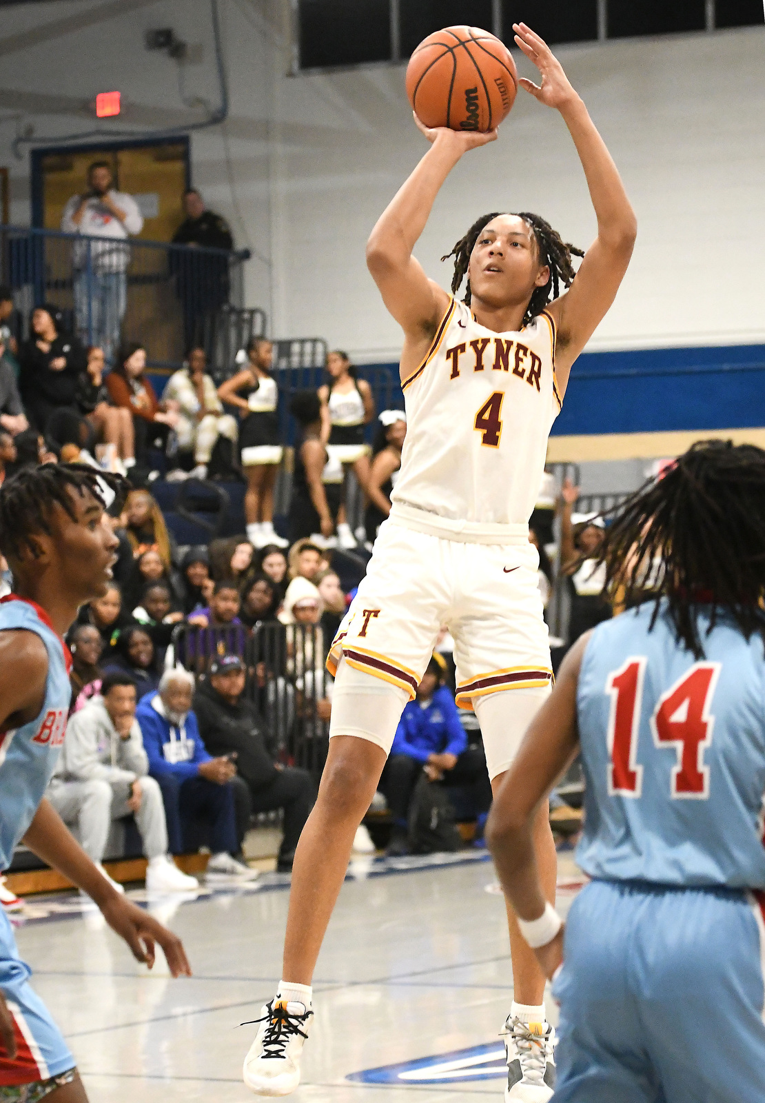 Staff Photo by Robin Rudd / Tyner's Zion Pinkerton (4) shoots a jump shot. The Brainerd Panthers met the Tyner Rams in the District 4-AA tournament championship, played at Chattanooga School for Arts and Sciences, on February 20, 2024.