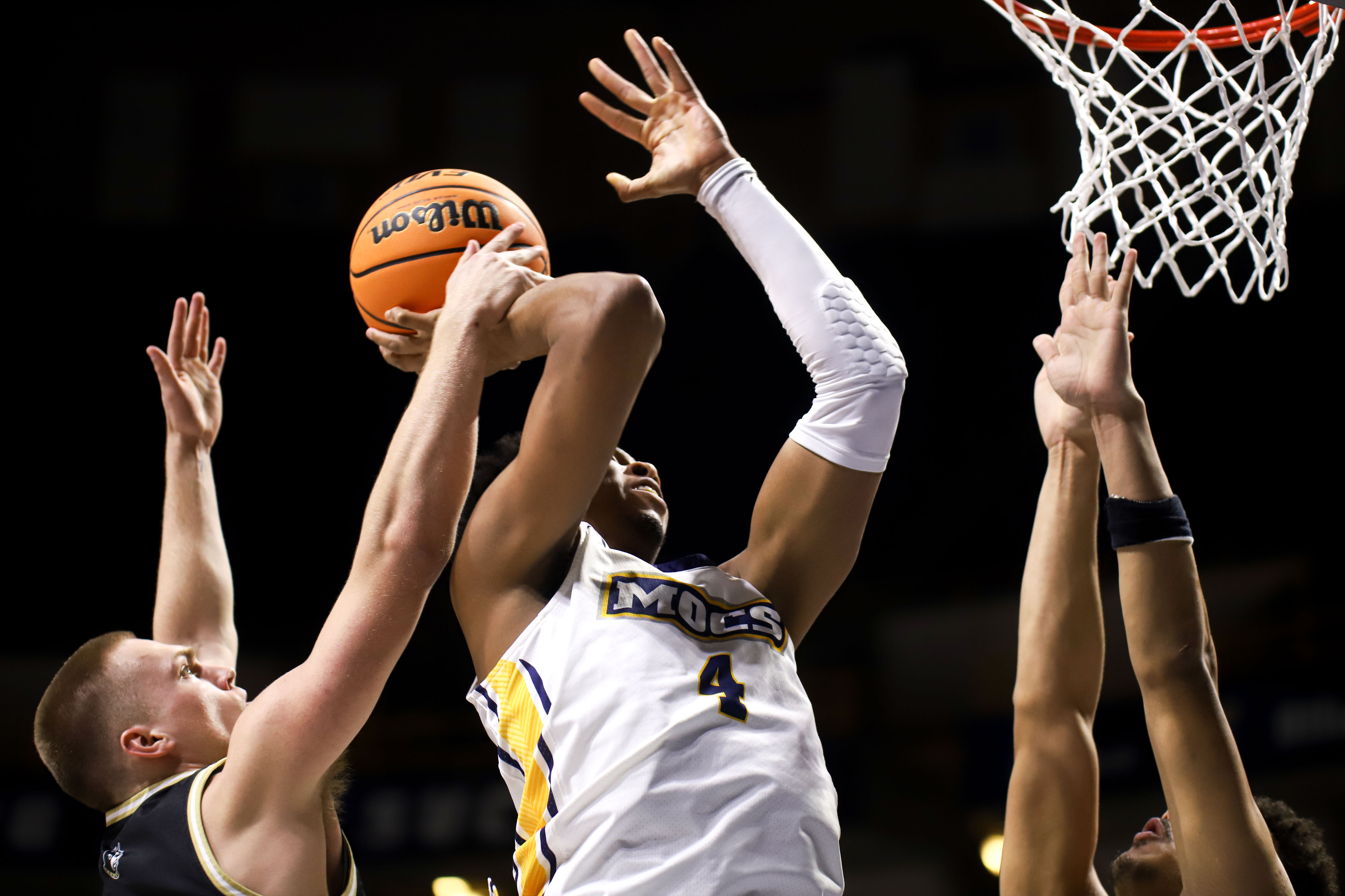 Staff photo by Olivia Ross / UTC's Sam Alexis (4) shoots. UT Chattanooga took on Wofford at home on Wednesday, February 21, 2024.