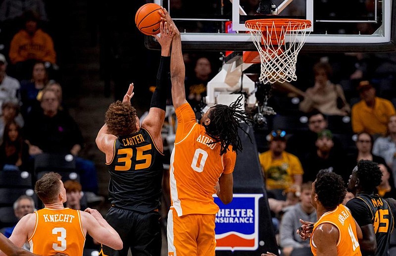 Tennessee Athletics photo / Tennessee junior forward Jonas Aidoo blocks a shot during Tuesday night's 72-67 win at Missouri as Dalton Knecht (3) and Tobe Awaka (11) look on. Aidoo and Awaka combined for nearly 54 minutes of playing time, easily the most for that inside combination all season.