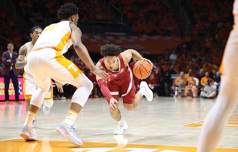Crimson Tide photos / Alabama senior guard Mark Sears drives the lane against Tennessee during the 91-71 loss to the Volunteers inside the Food City Center on Jan 20.