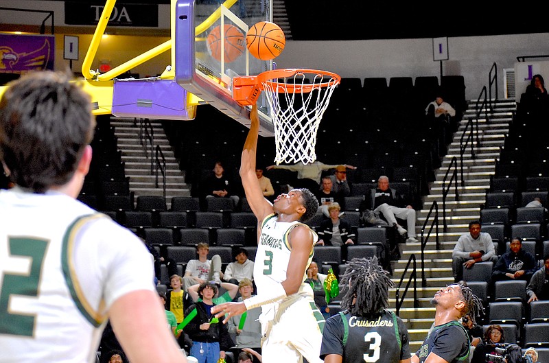 Staff photo by Patrick MacCoon / Silverdale Baptist's Kennedy Okpara scores at the rim in Friday's TSSAA Division II-A state semifinal against First Assembly Christian School at Tennessee Tech University in Cookeville.