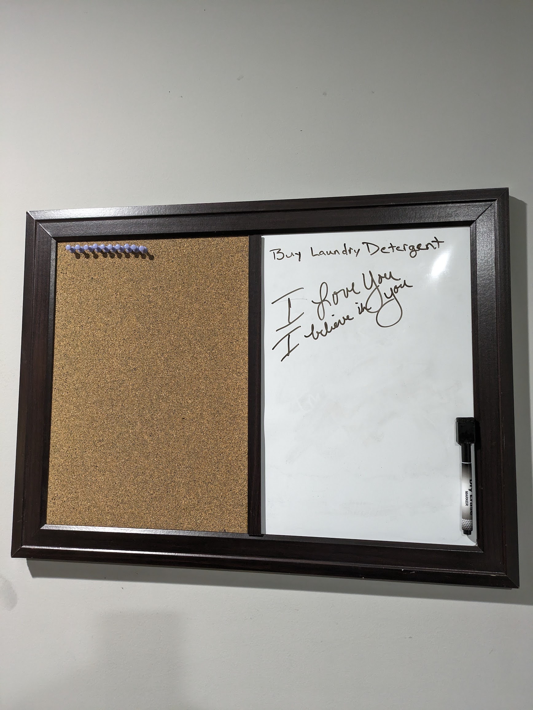 The Door to Serenity men's house in Mobile, Ala., allows people to stay in a drug-free space at a low cost. Executive Director Lisa Teggart left one of the residents a message on his white board: “I love you. I believe in you.” (Aneri Pattani/KFF Health News)