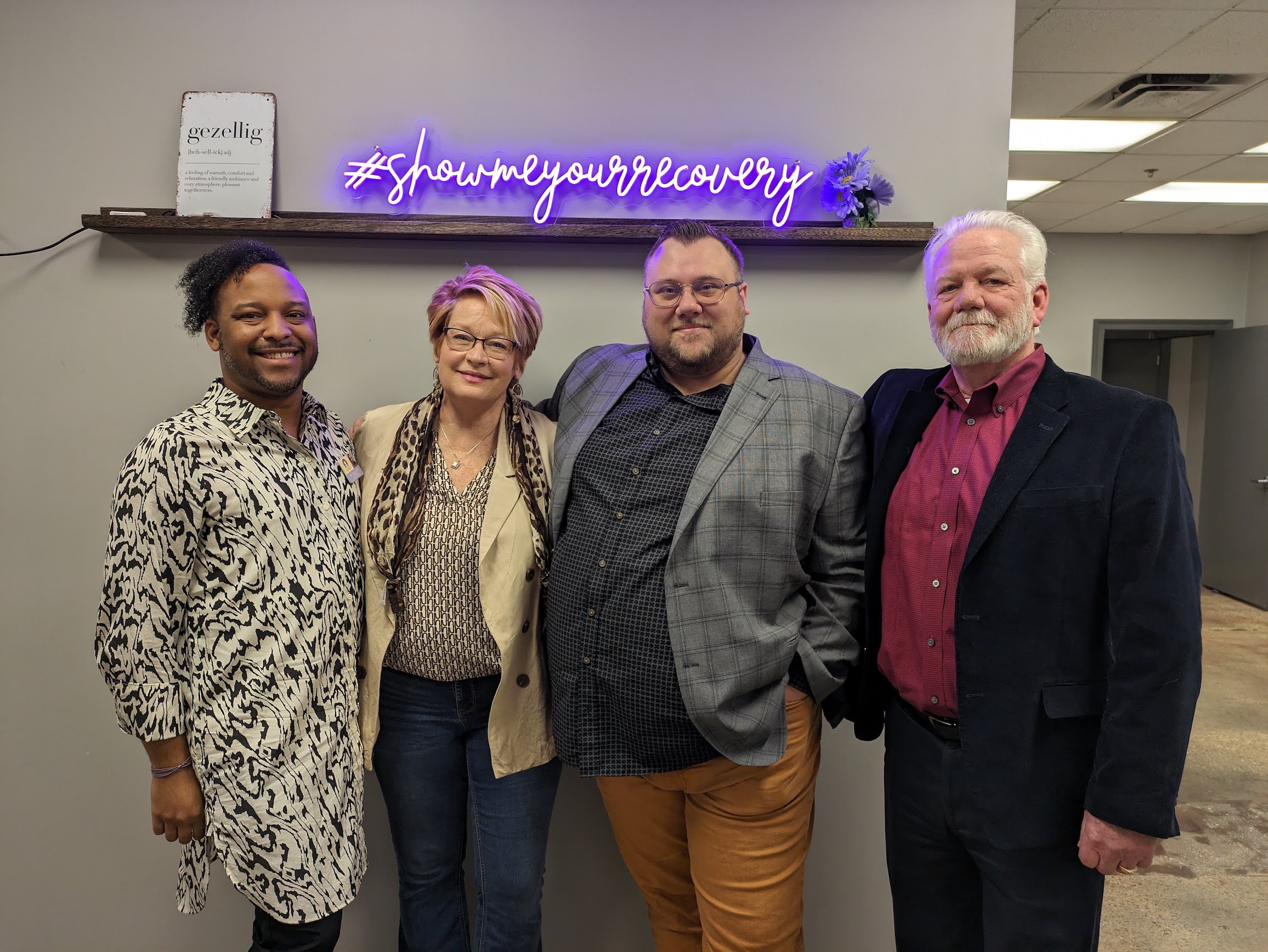 From left, Devin Burton, Lisa Teggart, Chance Shaw and Larry Vahle are recovery advocates in Mobile, Ala., who say they want opioid settlement dollars to support direct services like treatment and housing that can help people in crisis today. (Aneri Pattani/KFF Health News)