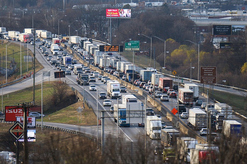 Staff File Photo by Olivia Ross / Semitrucks are caught in a traffic jam along Interstate 24 in Chattanooga in December. Commute times are said to be among the factors causing Tennesseans to be stressed out.