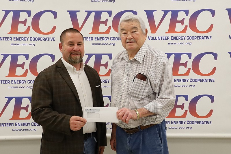 Contributed photo / Volunteer Energy Cooperative Customers Share board member Bobby Scott, at right, recently presented a $1,000 check to Central High School FFA representative Jeremy Kaylor.