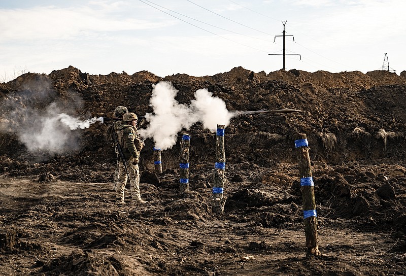 File photo/Lynsey Addario/The New York Times / Ukrainian soldiers who were fighting in Avdiivka until the final days of the battle train at a training ground in Eastern Ukraine, on Feb. 23, 2024.