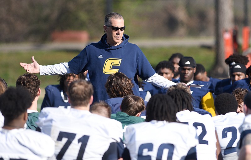 Staff photo by Matt Hamilton / UTC football coach Rusty Wright talks to his players after a practice Thursday at Scrappy Moore Field. The Mocs closed out five weeks of spring practices with Friday night's showcase at Finley Stadium.