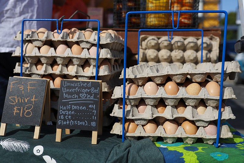 Staff photo by Olivia Ross / Eggs from Feathers & Fruit are seen Wednesday at the Main Street Farmers Market.