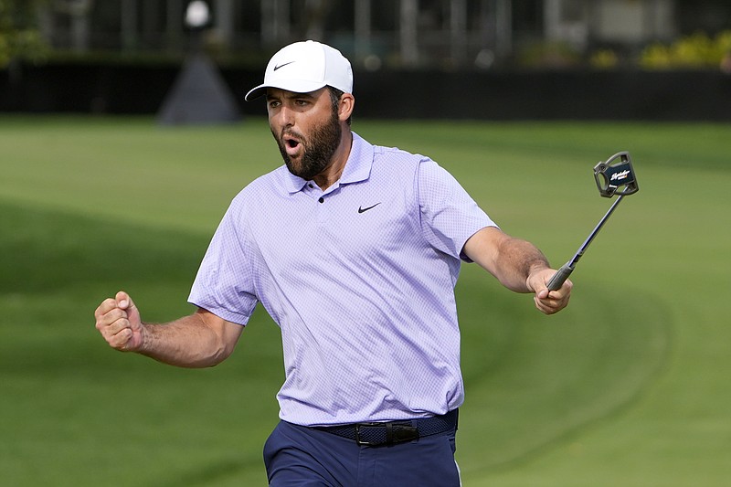 AP photo by John Raoux / Scottie Scheffler celebrates after a birdie putt on the 15th green at Bay Hill Club during the final round of the PGA Tour's Arnold Palmer Invitational on Sunday in Orlando, Fla.