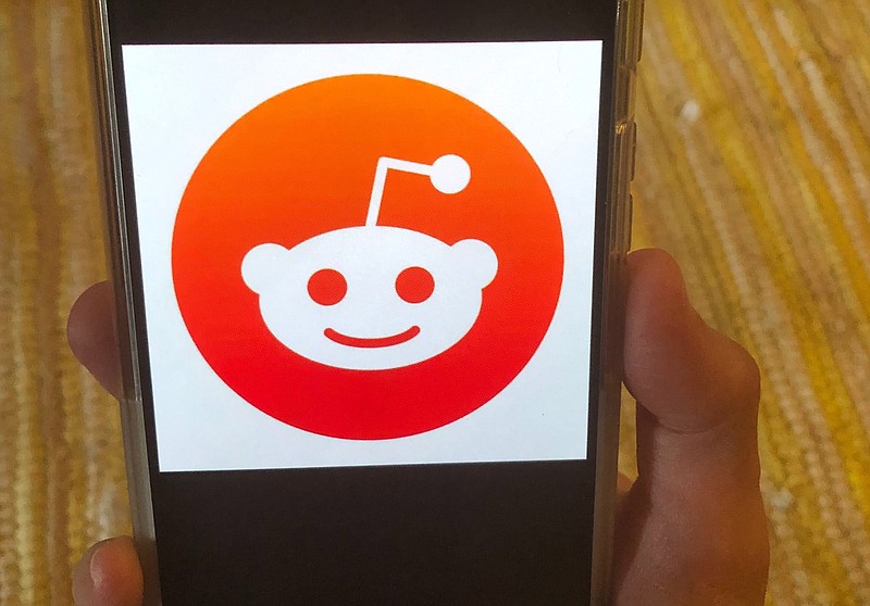 FILE - This June 29, 2020 file photo shows the Reddit logo on a mobile device in New York. Reddit is looking to raise almost $750 million in an initial public offering of its common stock. The company said in a regulatory filing that the IPO will include 22 million shares of Class A common stock. (AP Photo/Tali Arbel, File)