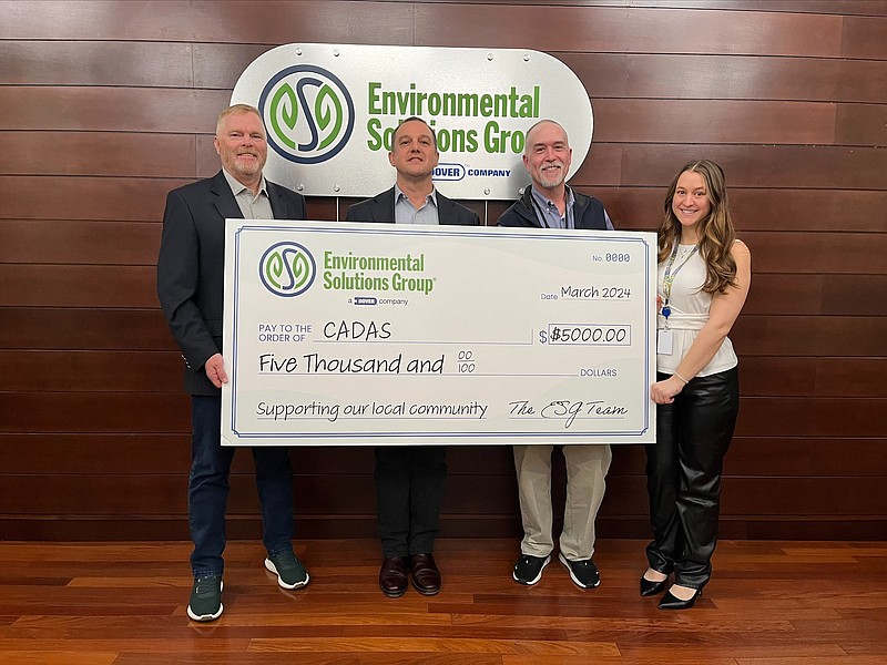 Contributed photo / At the check presentation from ESG to CADAS in support of the nonprofit addiction recovery facility's mission, from left, are Pat Carroll, president of Environmental Solutions Group; Thad Oliver, project manager at CADAS; Knox Farmer, CADAS marketing director; and Jessica Coco, public relations and events coordinator at ESG.