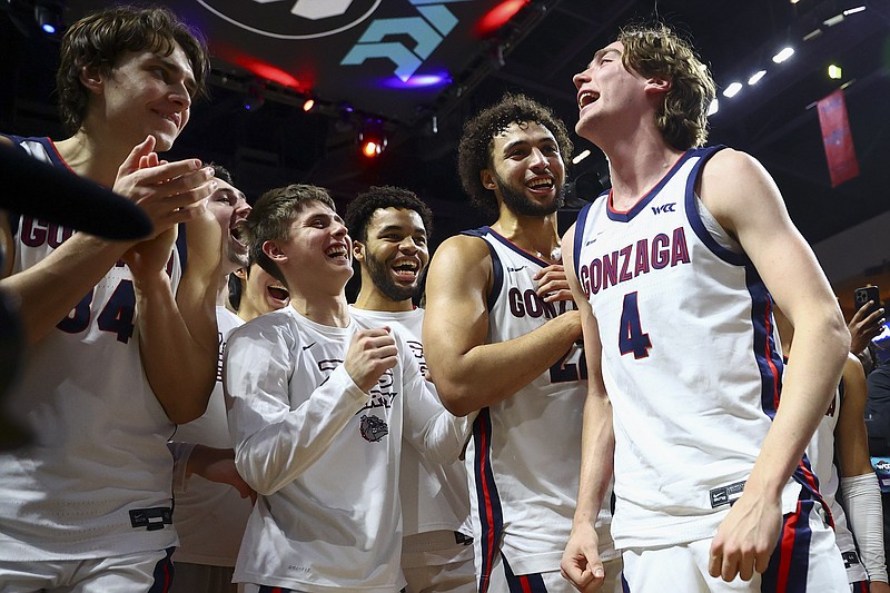 AP photo by Ellen Schmidt / Gonzaga basketball players celebrate after defeating San Francisco in a West Coast Conference tournament semifinal on March 11 in Las Vegas.