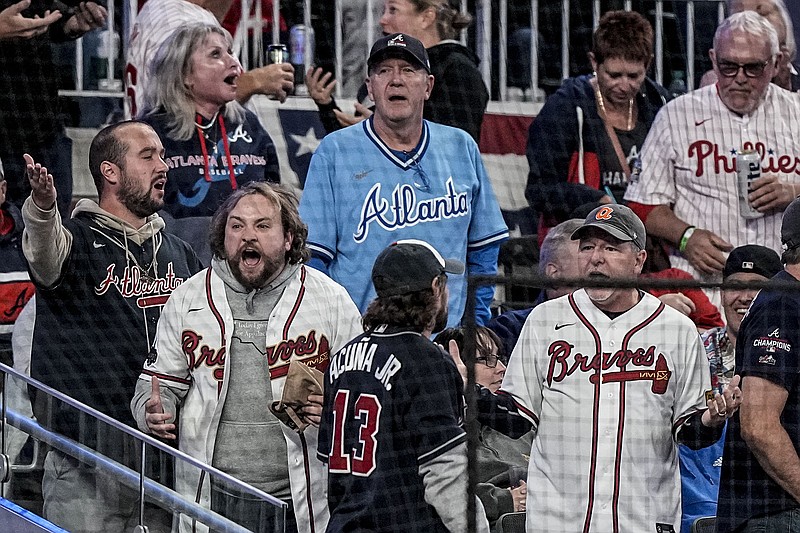 AP photo by Brynn Anderson / Atlanta Braves fans react during the team's home game against the Philadelphia Phillies in the opener of their NL Division Series on Oct. 7, 2023.
