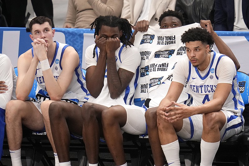 AP photo by Gene J. Puskar / Players on the Kentucky bench watch late in the second half of the Wildcats' loss to Oakland on Thursday night in Pittsburgh during the first round of the NCAA Division I men's basketball tournament.