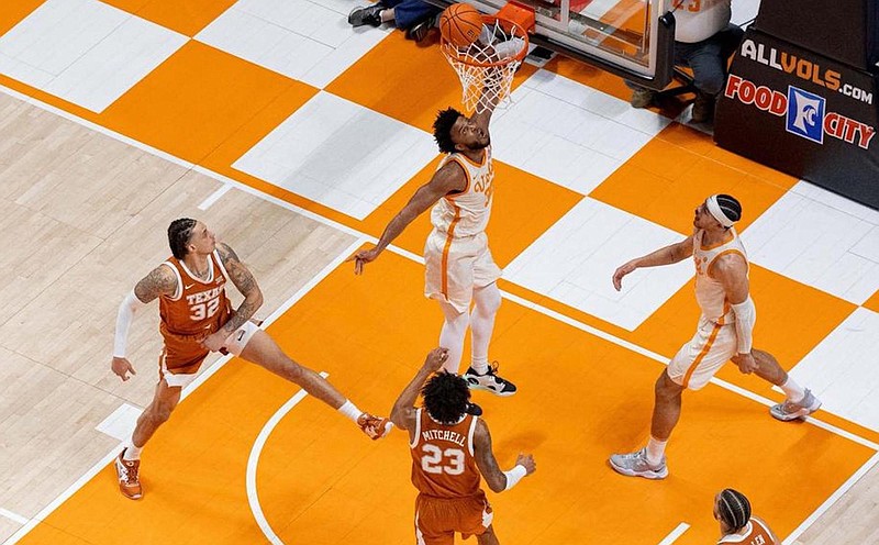 Tennessee Athletics photo / Josiah-Jordan James looks up at the basket after making a layup during Tennessee's 82-71 triumph over Texas in last year's Big 12/SEC Challenge. The Volunteers and Longhorns meet Saturday night in Charlotte, N.C., for a berth in the NCAA tournament's Sweet 16.