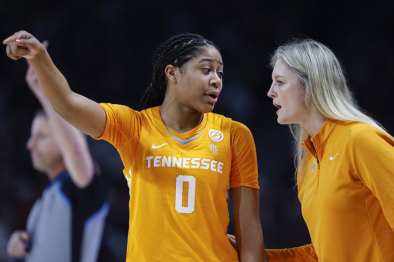 AP photo by Nell Redmond / Tennessee basketball coach Kellie Harper talks to guard Jewel Spear during the team's regular-season finale at SEC champion South Carolina on March 3.