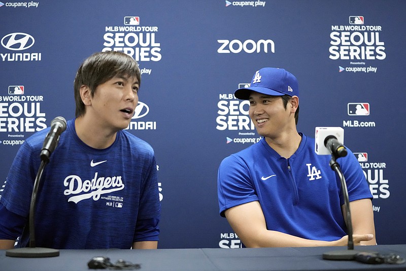 AP photo by Lee Jin-man / Los Angeles Dodgers player Shohei Ohtani, right, and his interpreter, Ippei Mizuhara, attend a news conference last Saturday in Seoul, South Korea.
