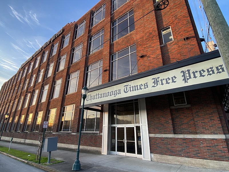 Staff Photo by Robin Rudd /  The Chattanooga Times Free Press building, located at 400 East 11th Street, is seen as the sun rises on March 21, 2023.