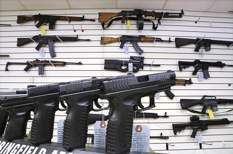File photo/Seth Perlman/The Associated Press / Semi-automatic guns are displayed for sale at Capitol City Arms Supply on Jan. 16, 2013, in Springfield, Ill.