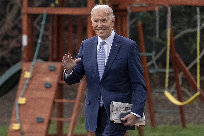 AP Photo/Andrew Harnik / President Joe Biden waves to members of the media as he walks toward Marine One on the South Lawn of the White House in Washington, D.C., Friday, March 22, 2024, to travel to Wilmington, Delaware.