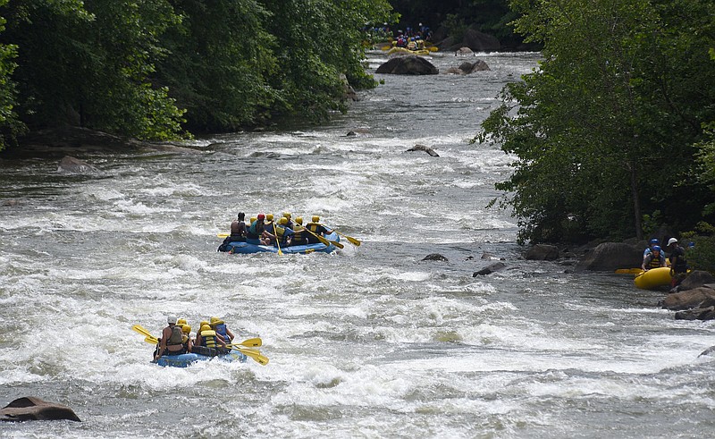 Staff photo by Matt Hamilton / Whitewater rafters make their way down the Ocoee River in Polk County, Tenn., in 2022. Tennessee lawmakers introduced bills seeking to add water release days on the Ocoee River to boost whitewater rafting and tourism in the area.