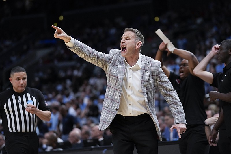 AP photo by Ashley Landis / Alabama men's basketball coach Nate Oats yells from the sideline during his team's win against North Carolina in an NCAA tournament Sweet 16 game Thursday night in Los Angeles.