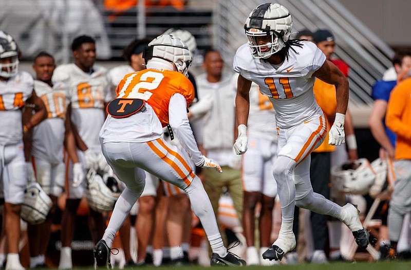 Tennessee Athletics photo / Cornerback Jalen McMurray (12) defends receiver Chris Brazzell (11) during a pairing of transfer players in Tennessee's first spring scrimmage last Wednesday.