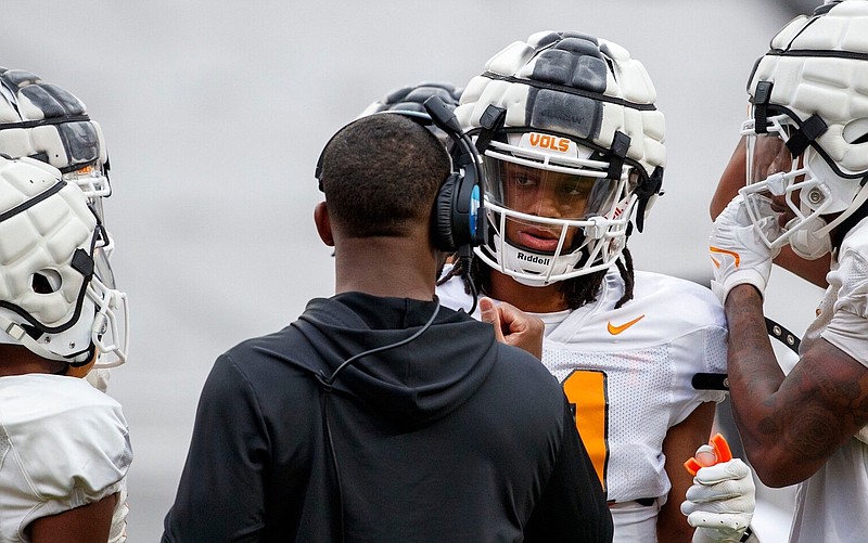 Tennessee Athletics photo by Kate Luffman / Tennessee redshirt sophomore receiver Chris Brazzell, a transfer from Tulane, listens to Volunteers receivers coach Kelsey Pope during a recent practice.