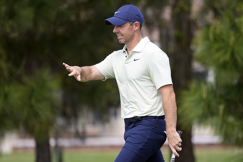 AP photo by Marta Lavandier / Rory McIlroy gestures on the second green of the Stadium Course at TPC Sawgrass during the final round of The Players Championship on March 17 in Ponte Vedra Beach, Fla.