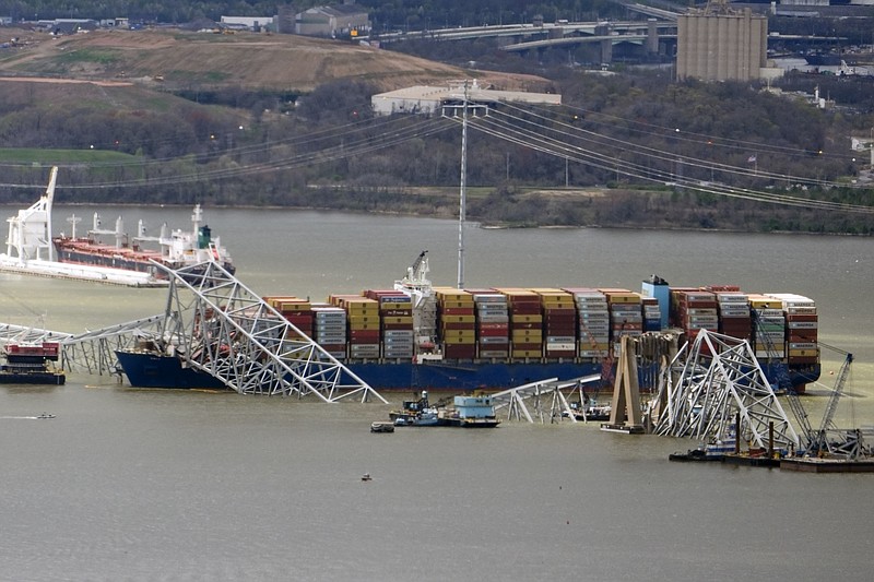 Photo/Manuel Balce Ceneta/The Associated Press / Wreckage of the Francis Scott Key Bridge rests on the container ship Dali in Baltimore on Friday, April 5, 2024.